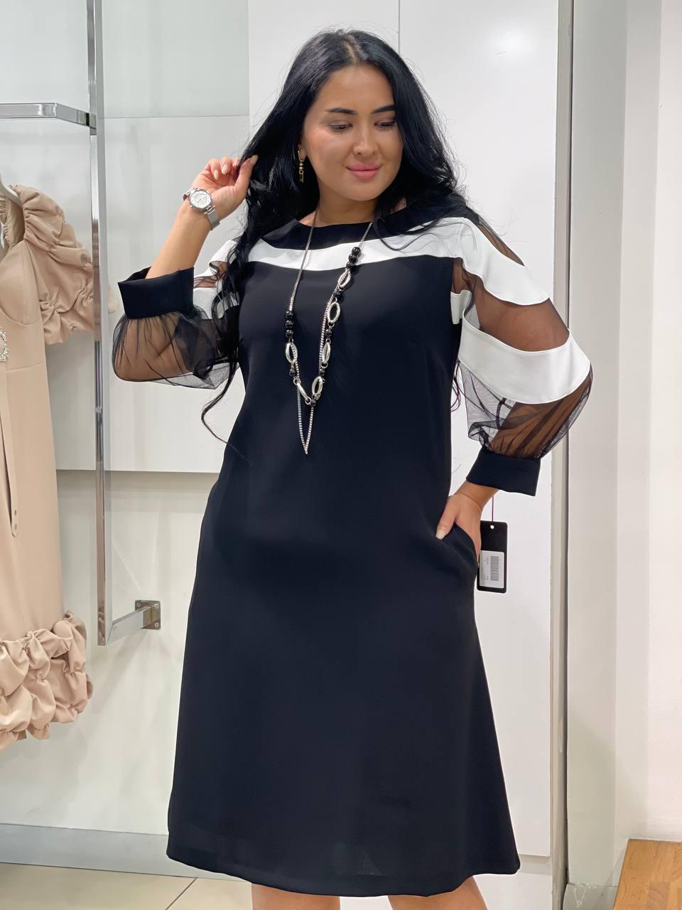 Knee-length dress. Knee-length dress.
