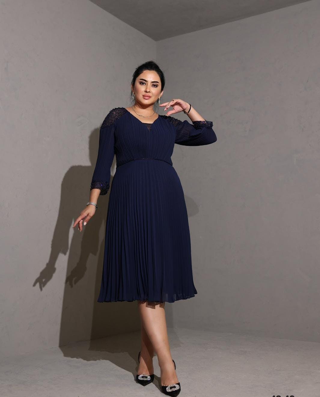 Knee length dress. Knee length dress.