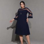 Knee length dress.
